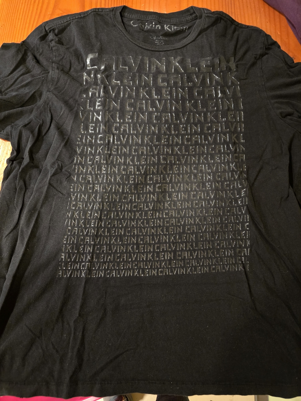 Calvin Klein Black Long Sleeve Tee with Repeated Logo Print